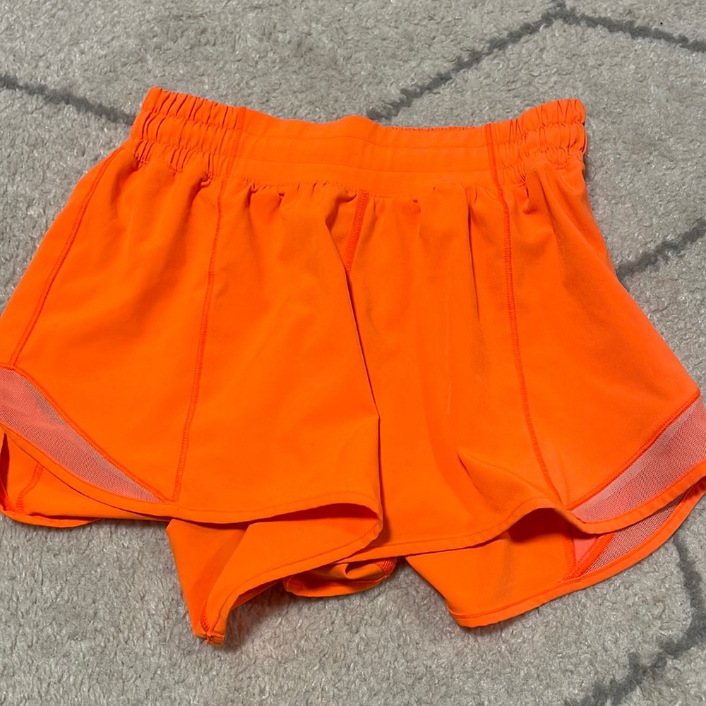 SIZE 2 HIGHLIGHT ORANGE LULULEMON SHORTS “4